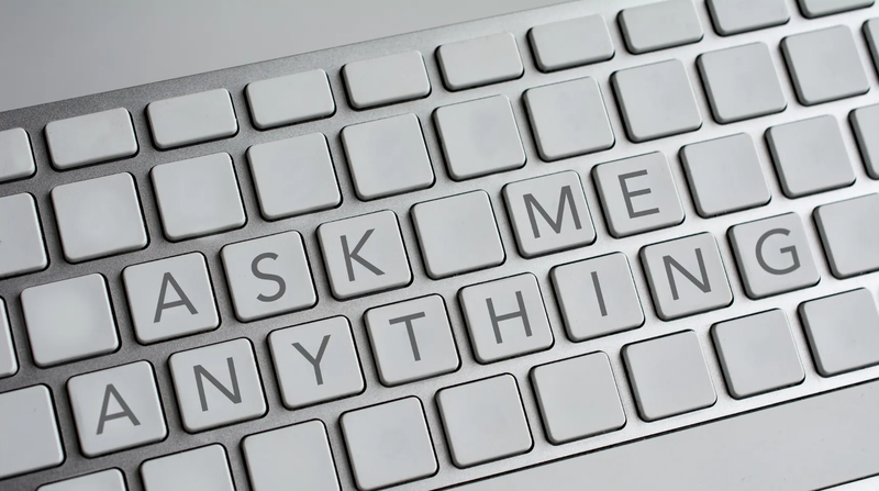 computer keyboard with "Ask me anything" engraved